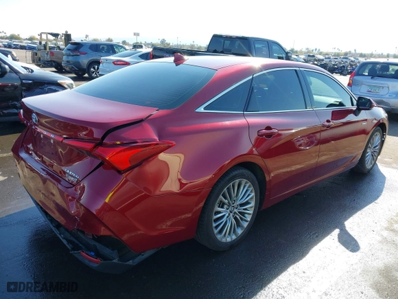 2019 Toyota Avalon Hybrid Limited with VIN 4T1B21FB8KU010221, listed as a IAAI auction lot 41470592 with 100,869 mi miles. Bid and sale history available at carsss.com. Image 4.