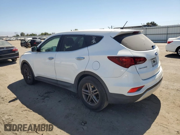 2018 Hyundai Santa Fe 2.4L with VIN 5XYZT3LB3JG511890, listed as a Copart auction lot 65801515 with 127,484 mi miles and Clean title. Bid and sale history available at DreamBid. Image 2.