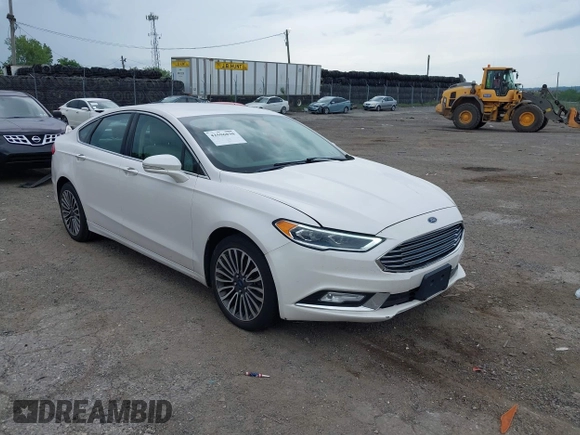 2017 Ford Fusion Titanium with VIN 3FA6P0K96HR115561, listed as a IAAI auction lot 42596030 with 187,865 mi miles and . Bid and sale history available at DreamBid. Image 1.