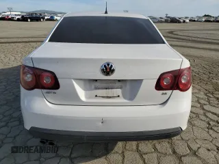 2010 Volkswagen Jetta Sedan S with VIN 3VWJZ7AJ2AM049092, listed as a Copart auction lot 52806955 with 251,408 mi miles and Salvage Title. Bid and sale history available at carsss.com. Image 6.