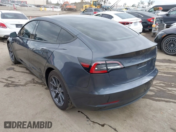 2018 Tesla Model 3 Long Range Battery with VIN 5YJ3E1EA0JF101564, listed as a IAAI auction lot 41902214 with 101,581 mi miles. Bid and sale history available at carsss.com. Image 3.