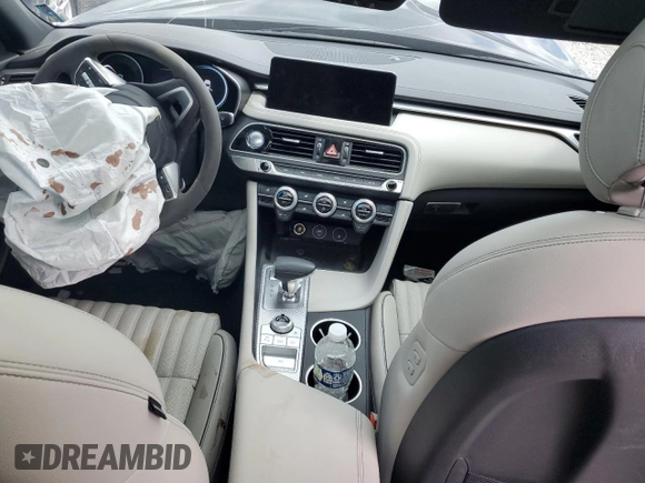 2023 Genesis G70 2.0T with VIN KMTG34TA2PU126768, listed as a Copart auction lot 56201094 with 11,556 mi miles and Salvage Title. Bid and sale history available at DreamBid. Image 8.