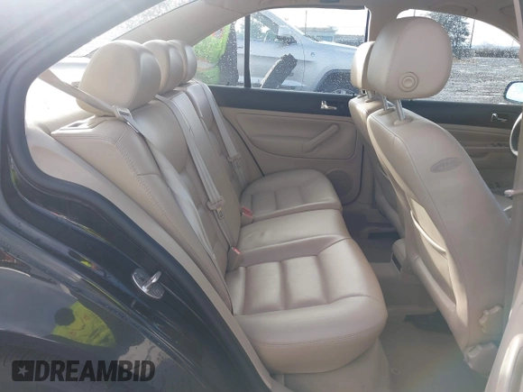 1999 Volkswagen Jetta GLS with VIN 3VWSA29M0XM084459, listed as a IAAI auction lot 41170665 with 76,790 mi miles and . Bid and sale history available at DreamBid. Image 8.