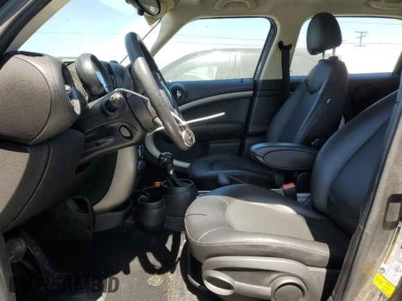 2014 MINI Countryman with VIN WMWZB3C54EWR39731, listed as a Copart auction lot 63635215 with 85,751 mi miles and Salvage title. Bid and sale history available at DreamBid. Image 7.