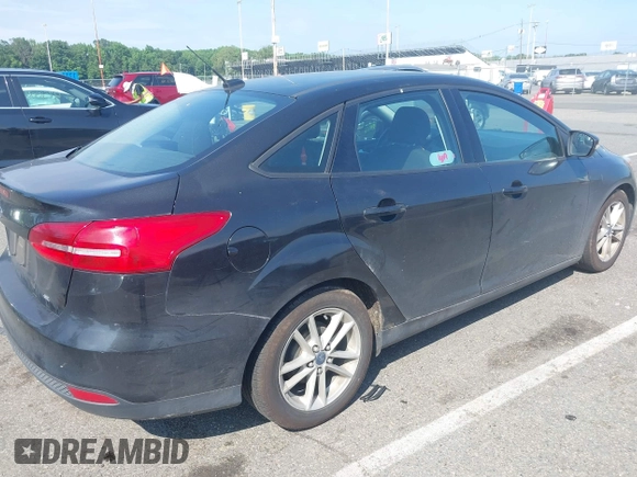 2015 Ford Focus SE with VIN 1FADP3F23FL258730, listed as a IAAI auction lot 42608180 with 212,647 mi miles and . Bid and sale history available at DreamBid. Image 6.
