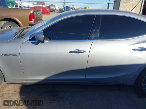2015 Maserati Ghibli z VIN ZAM57XSA7F1135961, wystawiony jako IAAI lot #40831583 z przebiegiem 89 671 mil mil oraz . Historia ofert i sprzedaży dostępna na DreamBid. Obrazek 14.