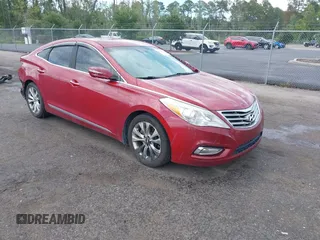 2013 Hyundai Azera z VIN KMHFG4JG8DA245858, wystawiony jako IAAI lot #42657593 z przebiegiem 157 718 mil mil oraz . Historia ofert i sprzedaży dostępna na DreamBid. Obrazek 1.