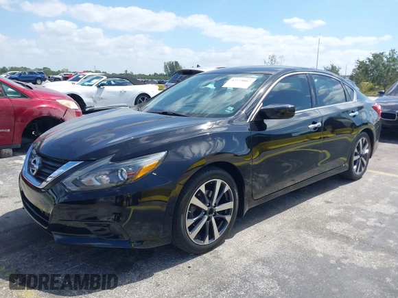 2016 Nissan Altima SR with VIN 1N4AL3AP4GC289147, listed as a IAAI auction lot 42159067 with 105,112 mi miles and . Bid and sale history available at carsss.com. Image 2.