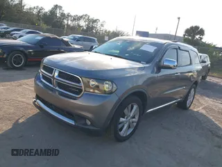 2011 Dodge Durango Crew with VIN 1D4SD4GT0BC630240, listed as a IAAI auction lot 41494046 with 174,343 mi miles and . Bid and sale history available at DreamBid. Image 2.