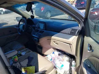 2010 Honda Odyssey Touring with VIN 5FNRL3H9XAB094765, listed as a IAAI auction lot 41892743 with 127,143 mi miles. Bid and sale history available at carsss.com. Image 5.