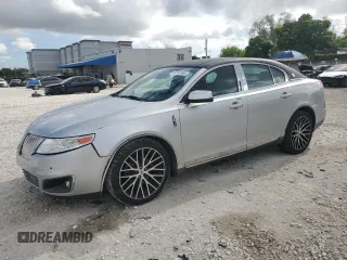 2009 Lincoln MKS with VIN 1LNHM93R39G626518, listed as a Copart auction lot 64302065 with 81,806 mi miles and Salvage title. Bid and sale history available at DreamBid. Image 1.