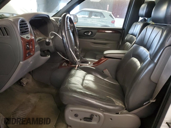 2002 GMC Envoy SLT with VIN 1GKDT13S622231265, listed as a Copart auction lot 45037215 with 213,069 mi miles and Salvage Title. Bid and sale history available at carsss.com. Image 7.