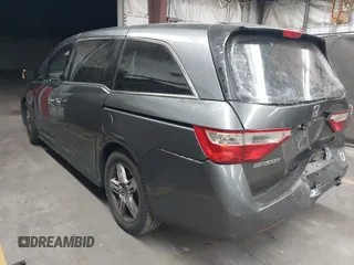 2012 Honda Odyssey Touring с VIN 5FNRL5H99CB047340, выставлен на аукционе IAAI как лот 41965189 с пробегом Не указан миль и . История ставок и продаж доступна на DreamBid. Изображение 3.
