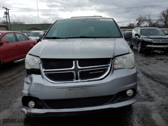 2017 Dodge Grand Caravan SXT with VIN 2C4RDGCG1HR624209, listed as a Copart auction lot 52095335 with 156,761 mi miles and Salvage Title. Bid and sale history available at carsss.com. Image 5.