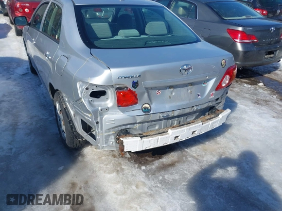 2010 Toyota Corolla with VIN JTDBU4EE3A9098933, listed as a IAAI auction lot 41643811 with 69,806 mi miles. Bid and sale history available at carsss.com. Image 6.