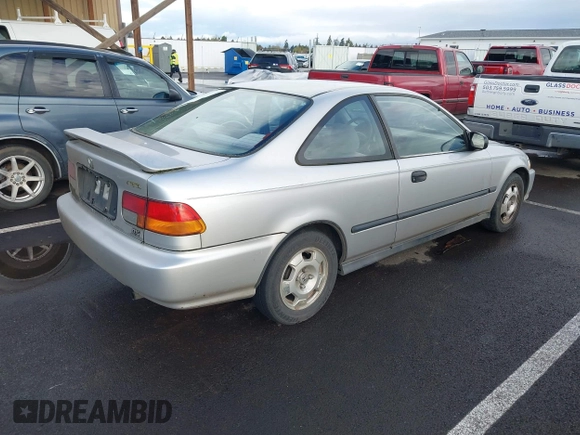 1998 Honda Civic DX with VIN 1HGEJ6221WL134982, listed as a IAAI auction lot 41904339 with 245,496 mi miles. Bid and sale history available at carsss.com. Image 4.