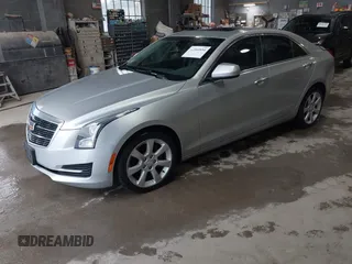 2016 Cadillac ATS Standard AWD z VIN 1G6AG5RX6G0149829, wystawiony jako IAAI lot #42165534 z przebiegiem 40 996 mil mil oraz . Historia ofert i sprzedaży dostępna na DreamBid. Obrazek 17.