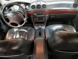2002 Chrysler 300M M z VIN 2C3HE66G92H238752, wystawiony jako Copart lot #84894784 z przebiegiem 181 165 mil mil oraz Czysty tytuł • Clean title. Historia ofert i sprzedaży dostępna na DreamBid. Obrazek 8.
