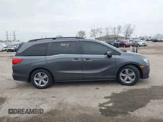 2018 Honda Odyssey EX-L with VIN 5FNRL6H72JB076597, listed as a IAAI auction lot 41838664 with 154,647 mi miles and . Bid and sale history available at DreamBid. Image 13.
