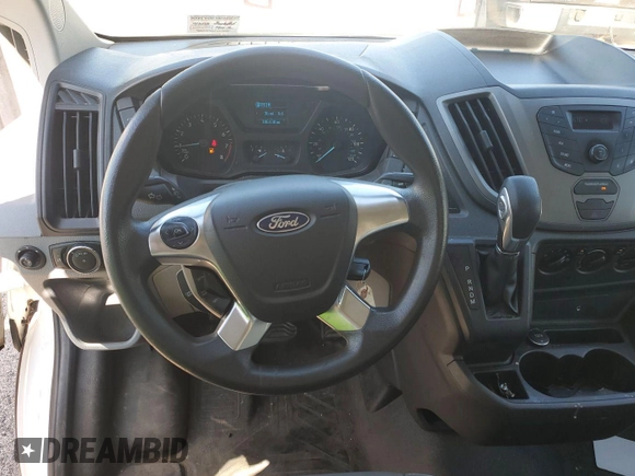 2016 Ford Transit Cargo z VIN 1FTYE1YM3GKB18575, wystawiony jako IAAI lot #42734024 z przebiegiem 186 138 mil mil oraz . Historia ofert i sprzedaży dostępna na DreamBid. Obrazek 22.