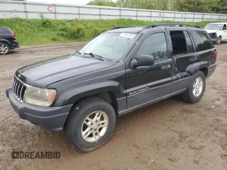 2003 Jeep Grand Cherokee Laredo z VIN 1J4GW48S53C568929, wystawiony jako Copart lot #57604245 z przebiegiem 216 103 mil mil oraz Czysty tytuł • Clean title. Historia ofert i sprzedaży dostępna na DreamBid. Obrazek 1.