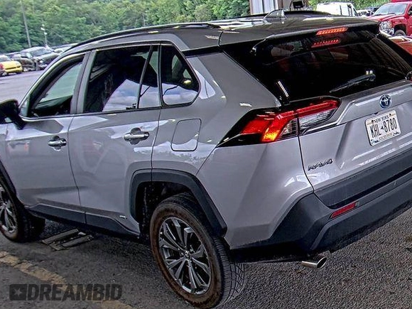 2022 Toyota RAV4 Hybrid XLE Premium with VIN 4T3B6RFV2NU084419, listed as a IAAI auction lot 42729518 with 76,607 mi miles and . Bid and sale history available at DreamBid. Image 6.