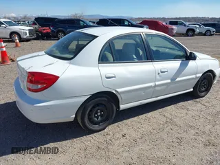 2003 Kia Rio with VIN KNADC125836211761, listed as a IAAI auction lot 41637622 with 117,010 mi miles. Bid and sale history available at carsss.com. Image 4.