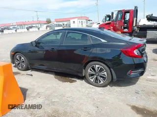 2016 Honda Civic Sedan EX-L with VIN 19XFC1F70GE011836, listed as a IAAI auction lot 41929383 with 186,497 mi miles. Bid and sale history available at carsss.com. Image 14.