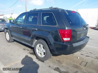 2005 Jeep Grand Cherokee Laredo with VIN 1J8GS48K95C615330, listed as a IAAI auction lot 41719101 with 152,186 mi miles. Bid and sale history available at carsss.com. Image 3.
