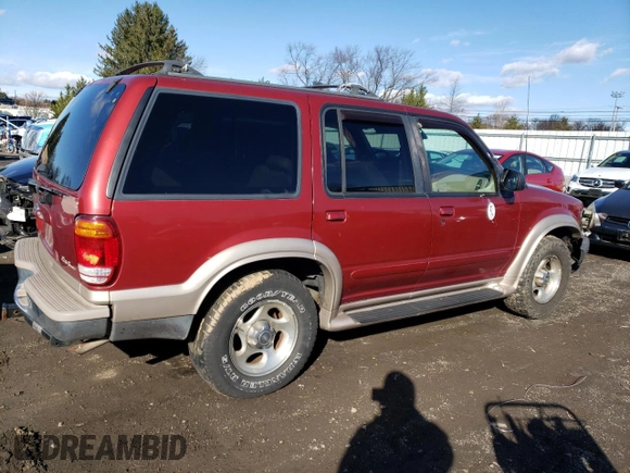 1999 Ford Explorer XLT with VIN 1FMDU34E7XZA60386, listed as a Copart auction lot 86851594 with 218,592 mi miles and Salvage title. Bid and sale history available at DreamBid. Image 3.