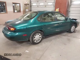 1996 Ford Taurus GL z VIN 1FALP52U5TG110582, wystawiony jako IAAI lot #40858639 z przebiegiem 57 965 mil mil oraz . Historia ofert i sprzedaży dostępna na DreamBid. Obrazek 4.