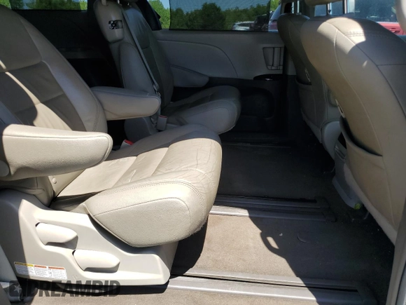 2015 Toyota Sienna XLE with VIN 5TDYK3DCXFS676402, listed as a Copart auction lot 54733845 with 173,044 mi miles and Salvage Title. Bid and sale history available at DreamBid. Image 11.
