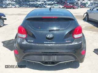 2016 Hyundai Veloster Turbo with VIN KMHTC6AE5GU281597, listed as a IAAI auction lot 42006038 with 77,642 mi miles. Bid and sale history available at carsss.com. Image 17.