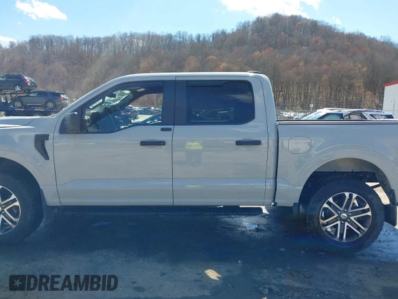 2023 Ford F-150 XL with VIN 1FTFW1E51PFB15197, listed as a IAAI auction lot 41869063 with 33,980 mi miles and . Bid and sale history available at DreamBid. Image 15.