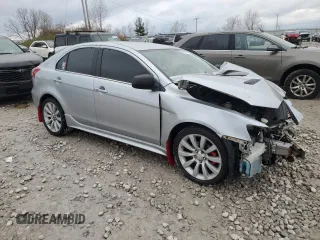 2010 Mitsubishi Lancer with VIN JA32Y6HV9AU002911, listed as a Copart auction lot 83633024 with Not Provided miles and Clean Title. Bid and sale history available at DreamBid. Image 4.