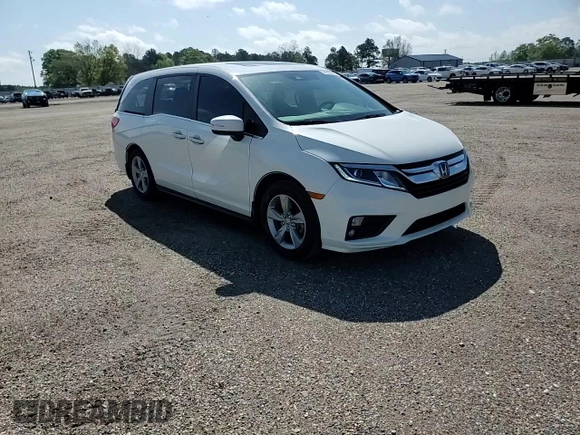2018 Honda Odyssey EX-L z VIN 5FNRL6H78JB104144, wystawiony jako Copart lot #51513935 z przebiegiem 76 507 mil mil oraz Szkoda całkowita • Salvage title. Historia ofert i sprzedaży dostępna na DreamBid. Obrazek 11.