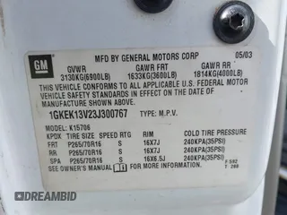 2003 GMC Yukon SLT with VIN 1GKEK13V23J300767, listed as a IAAI auction lot 41691632 with 251,849 mi miles. Bid and sale history available at carsss.com. Image 9.