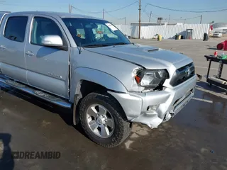 2013 Toyota Tacoma PreRunner with VIN 3TMKU4HN8DM034338, listed as a IAAI auction lot 41808842 with 142,012 mi miles and . Bid and sale history available at DreamBid. Image 6.