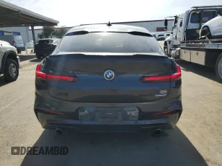 2020 BMW X4 xDrive30i with VIN 5UX2V1C04L9C32419, listed as a Copart auction lot 46427975 with 58,623 mi miles and Salvage Title. Bid and sale history available at carsss.com. Image 6.