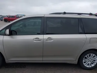 2015 Toyota Sienna XLE with VIN 5TDYK3DCXFS578888, listed as a IAAI auction lot 42187384 with 105,287 mi miles and . Bid and sale history available at DreamBid. Image 14.