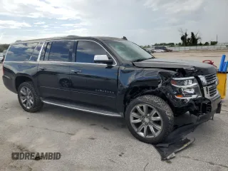 2015 Chevrolet Suburban LTZ with VIN 1GNSCKKCXFR613516, listed as a Copart auction lot 65519984 with 191,711 mi miles and Non Repairable. Bid and sale history available at DreamBid. Image 4.