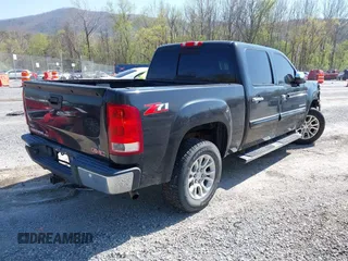 2010 GMC Sierra 1500 SLT with VIN 3GTRCWE09AG122055, listed as a IAAI auction lot 42064233 with 266,560 mi miles and . Bid and sale history available at DreamBid. Image 4.