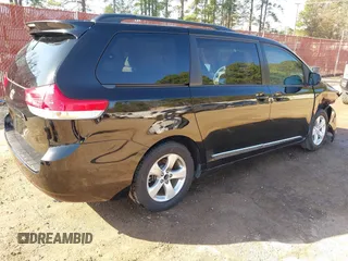 2012 Toyota Sienna LE AAS with VIN 5TDKK3DC6CS238848, listed as a IAAI auction lot 41728728 with 142,240 mi miles. Bid and sale history available at carsss.com. Image 4.