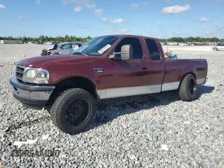 1998 Ford F-150 z VIN 1FTZX1763WNC22708, wystawiony jako Copart lot #56914515 z przebiegiem 179 011 mil mil oraz Szkoda całkowita • Salvage title. Historia ofert i sprzedaży dostępna na DreamBid. Obrazek 1.