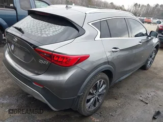 2017 Infiniti QX30 Luxury with VIN SJKCH5CR3HA031551, listed as a IAAI auction lot 41433856 with 113,570 mi miles. Bid and sale history available at carsss.com. Image 4.