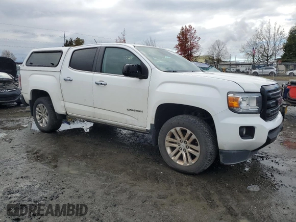 2016 GMC Canyon 4WD SLT with VIN 1GTP6DE11G1266217, listed as a Copart auction lot 82195694 with 129,578 mi miles and Clean Title. Bid and sale history available at carsss.com. Image 4.