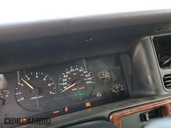 1996 Jeep Grand Cherokee Laredo z VIN 1J4EX58S3TC144191, wystawiony jako Copart lot #53153495 z przebiegiem 197 853 mil mil oraz Szkoda całkowita • Salvage title. Historia ofert i sprzedaży dostępna na DreamBid. Obrazek 9.