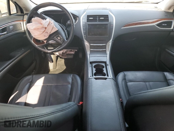 2015 Lincoln MKZ with VIN 3LN6L2J99FR602863, listed as a Copart auction lot 56679335 with 33,859 mi miles and Salvage title. Bid and sale history available at DreamBid. Image 8.