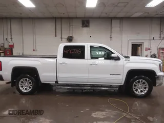 2016 GMC Sierra 1500 SLE z VIN 3GTU2MEC8GG187919, wystawiony jako IAAI lot #41967215 z przebiegiem 74 487 mil mil oraz . Historia ofert i sprzedaży dostępna na DreamBid. Obrazek 13.