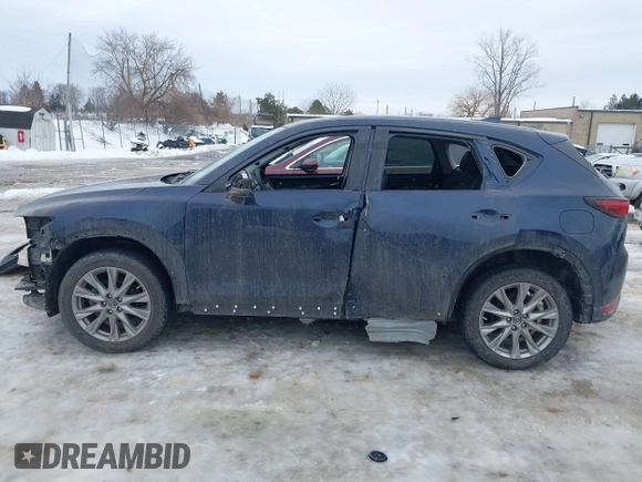 2020 Mazda CX-5 Grand Touring with VIN JM3KFBDM9L0778812, listed as a IAAI auction lot 41589208 with 39,385 mi miles. Bid and sale history available at carsss.com. Image 15.